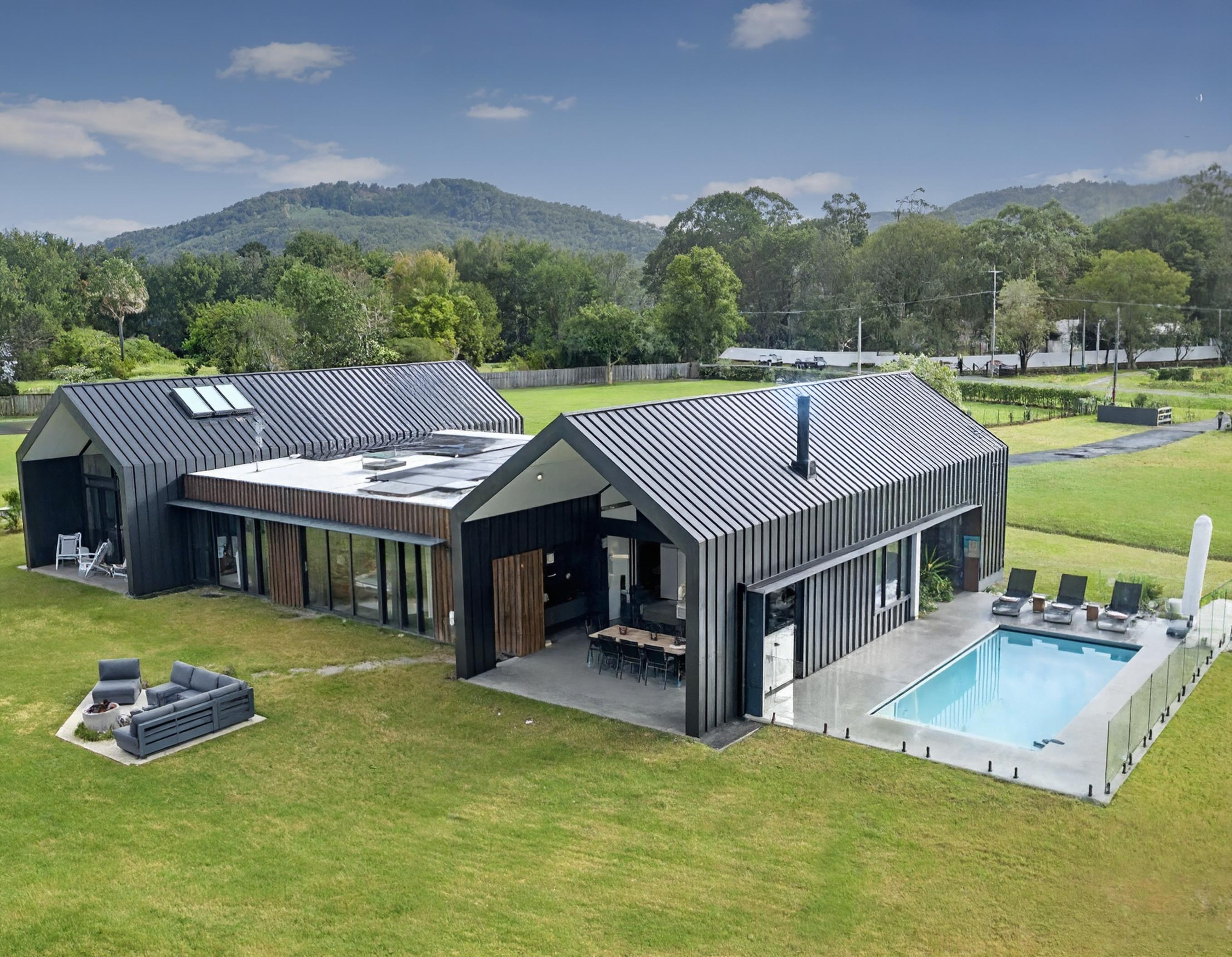 Modern barn home with pool and outdoor living