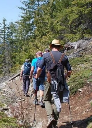 Men hiking through the Graystones trails