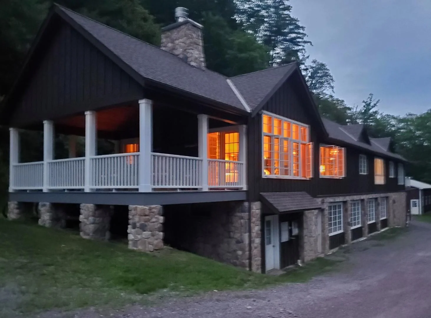 The lodge glowing warmly at night