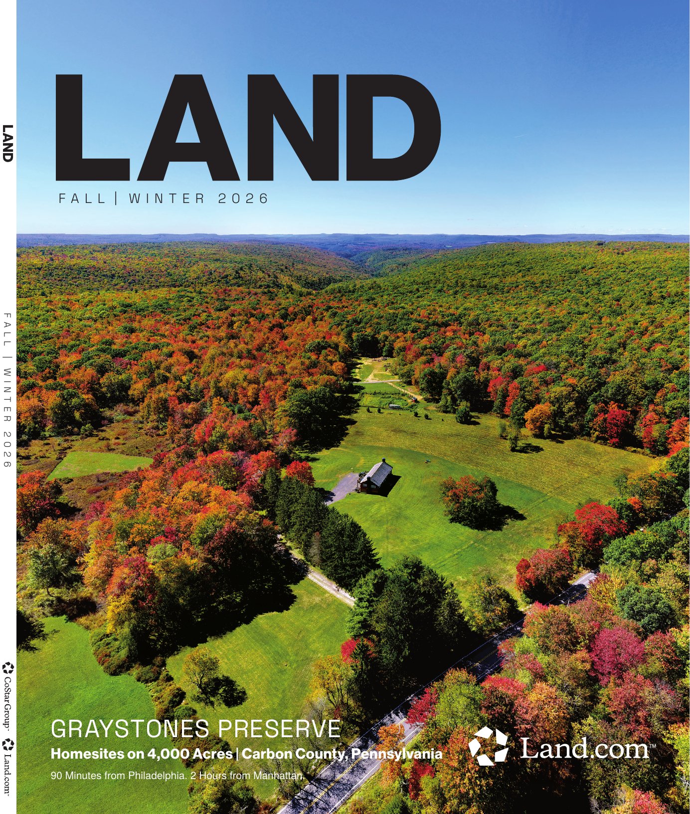 Graystones Preserve on the cover of Land Magazine, Fall/Winter 2026, aerial view of the meadow and lodge in autumn